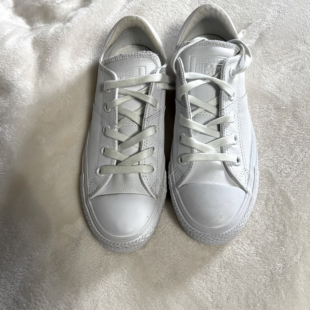 Converse all star white leather sneakers.